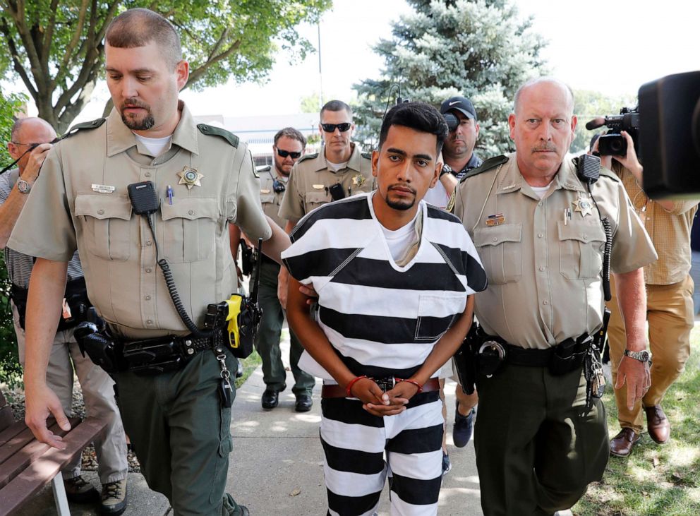 PHOTO: Cristhian Bahena Rivera is escorted into the Poweshiek County Courthouse for his initial court appearance, Aug. 22, 2018, in Montezuma, Iowa.