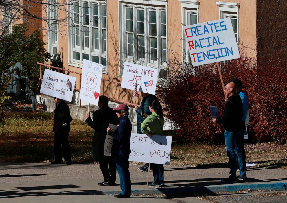 PHOTO: In this Nov. 12, 2021, file photo, people protest outside the offices of the New Mexico Public Education Department's office in Albuquerque, N.M.