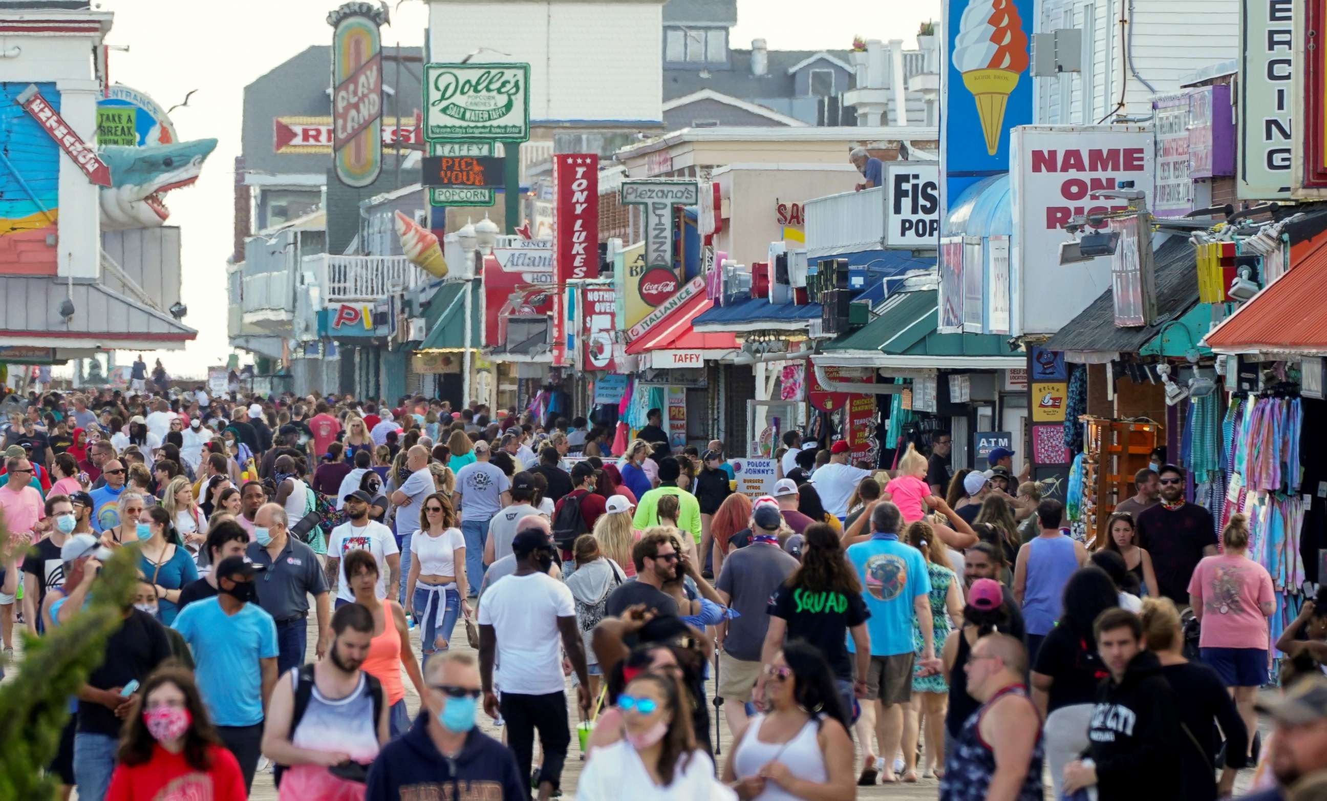 PHOTO: With the relaxing of the coronavirus disease (COVID-19) restrictions, visitors crowd the boardwalk on Memorial Day weekend in Ocean City, Maryland, May 23, 2020.