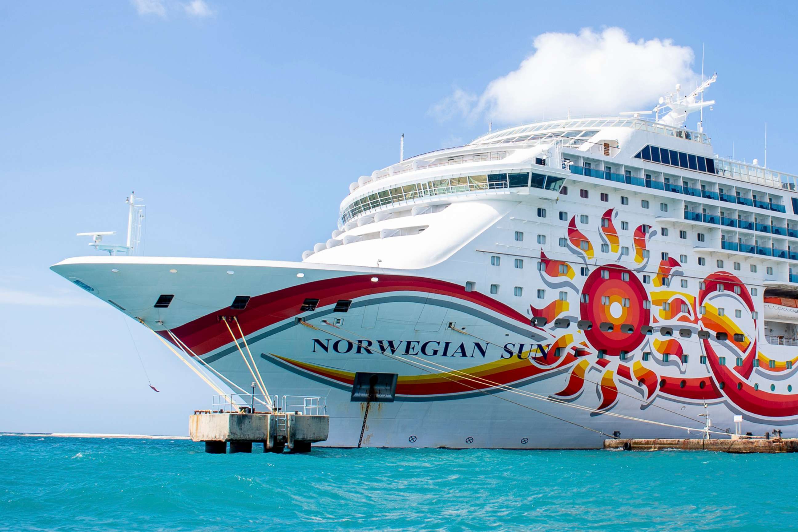 PHOTO: Norwegian Sun from Norwegian Cruise Line sits in the waters near the Dutch Carribean island of Aruba, Apr 23, 2021.