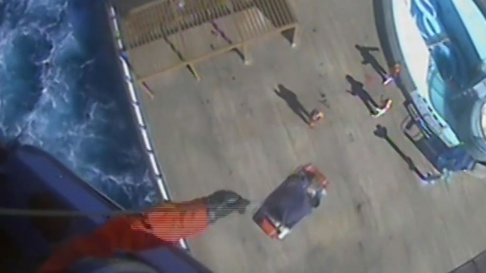 PHOTO: An image made from video shows a crew member from Coast Guard Air Station Savannah airlifting a woman from the Carnival Pride ship on Jan. 30, 2018.