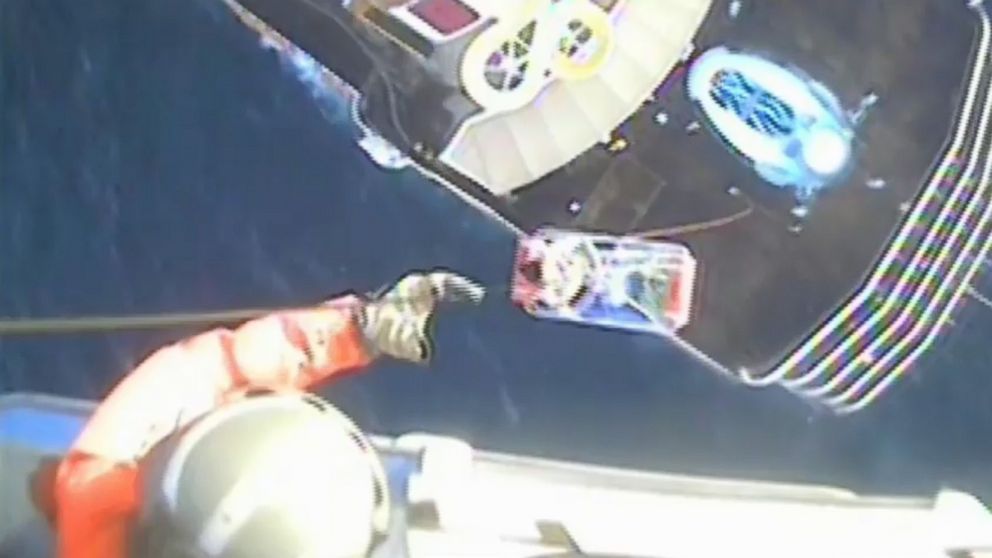 PHOTO: An image made from video shows a crew member from Coast Guard Air Station Savannah airlifting a woman from the Carnival Pride ship on Jan. 30, 2018.