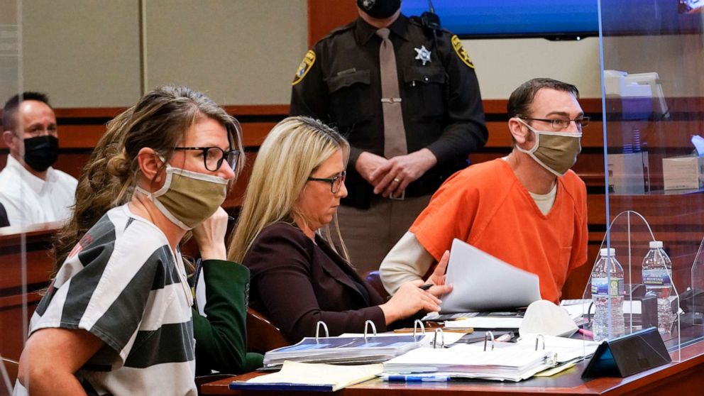 PHOTO: Jennifer Crumbley, left, and James Crumbley, right, the parents of Ethan Crumbley, a teenager accused of killing four students in a shooting at Oxford High School, appear in court in Rochester Hills, Mich., Feb. 8, 2022. 