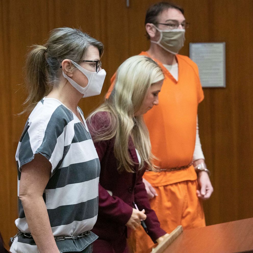 PHOTO: Jennifer Crumbley and her husband James Crumbley, parents of the alleged teen Oxford High School shooter Ethan Crumbley, appear for their pretrial hearing with defense attorney Mariell Lehman, center, March 22, 2022, in Pontiac, Mich.