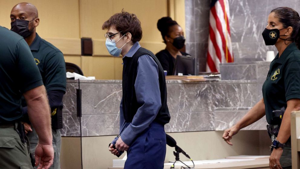 PHOTO: Marjory Stoneman Douglas High School shooter Nikolas Cruz crosses the courtroom in handcuffs, Oct. 20, 2021, at the Broward County Courthouse in Fort Lauderdale, Fla. 