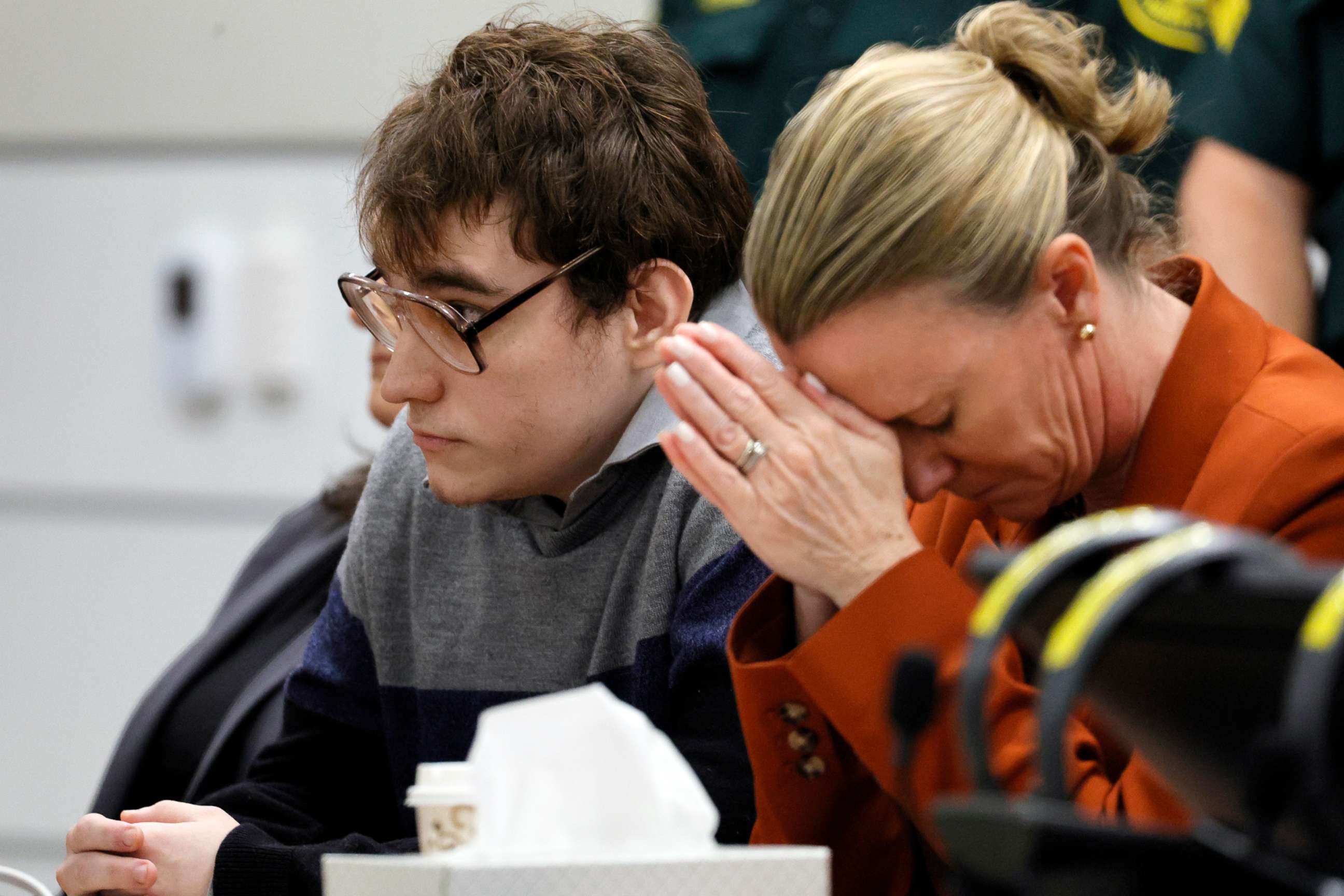 PHOTO: Assistant Public Defender Melisa McNeill, with Marjory Stoneman Douglas High School shooter Nikolas Cruz puts her hands to her head as the last of 17 verdicts were read in the penalty phase of Cruz's trial, Oct. 13, 2022, in Fort Lauderdale, Fla.
