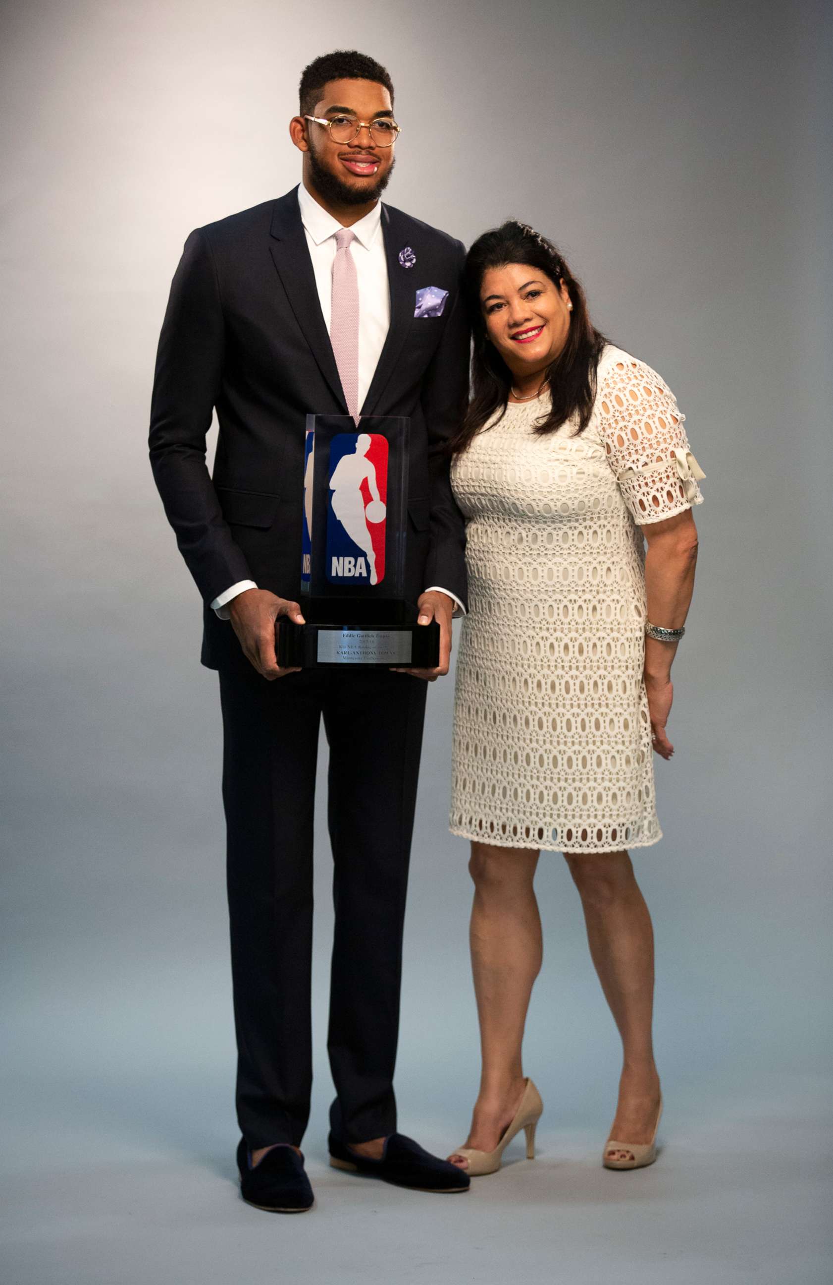 PHOTO: Timberwolves center Karl-Anthony Towns with his mother Jacqueline Cruz, as he had his official pictures taken by team photographer David Sherman after being named NBA Rookie of the Year in 2016. 