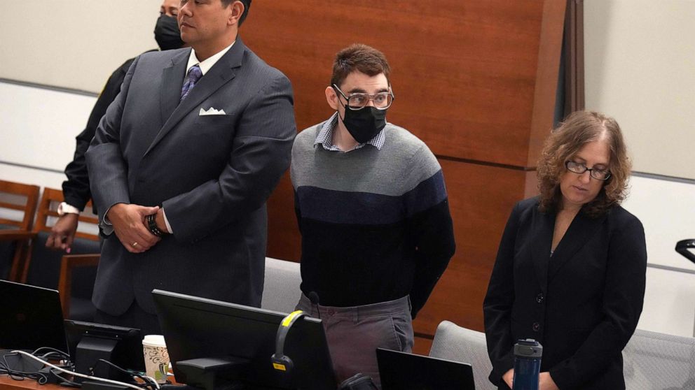 PHOTO: Marjory Stoneman Douglas High School shooter Nikolas Cruz with his attorneys stands before opening statements in the penalty phase of his trial at the Broward County Courthouse in Fort Lauderdale, Fla., July 18, 2022.