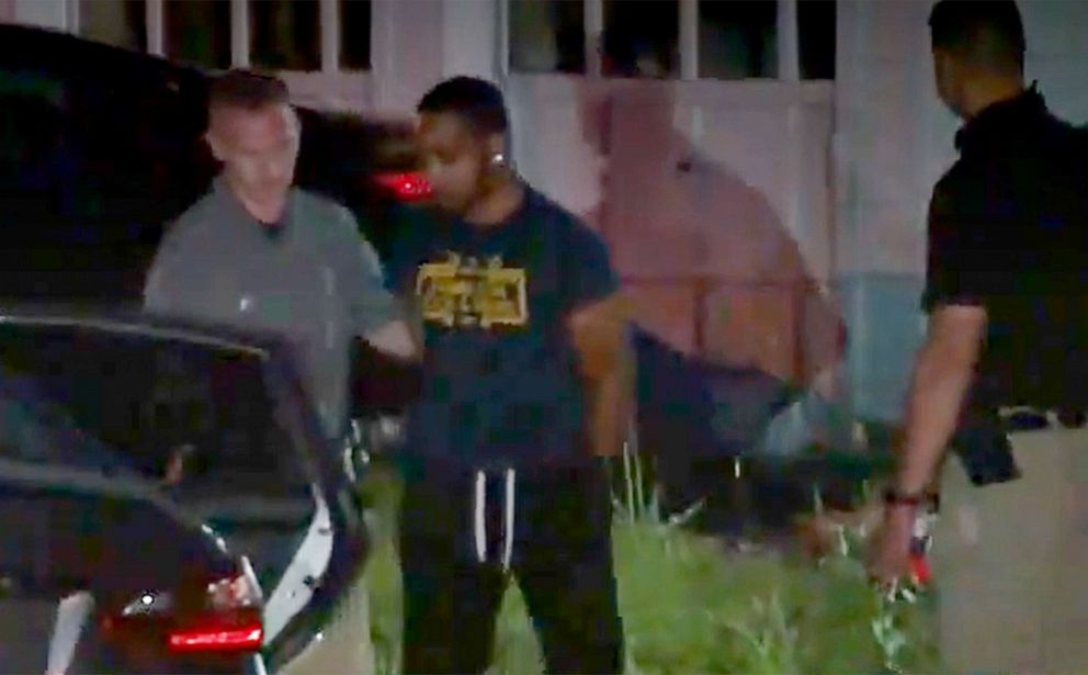 PHOTO: Tahj Hutchinson is taken into police custody in connection with the disappearance of his wife Jessica Edwards in South Windsor, Ct., May 21, 2021.