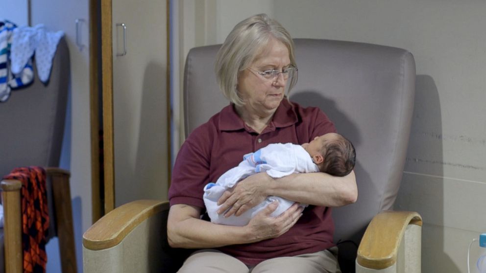 VIDEO: 'Cuddle volunteers' help soothe West Virginia's drug-exposed babies back to good health.