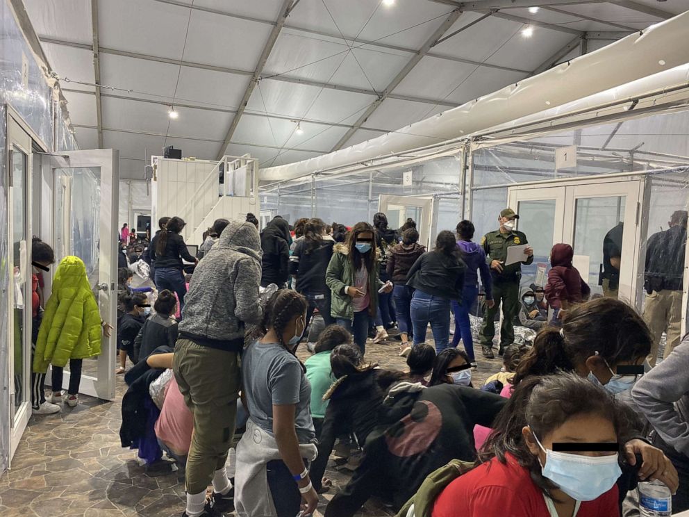PHOTO: A photo released by Congressman Henry Cuellar's office shows a crowded U.S. Customs and Border Protection temporary overflow facility in Donna, Texas. According to Rep. Cueller, the photo was taken between March 20-21, 2021.  