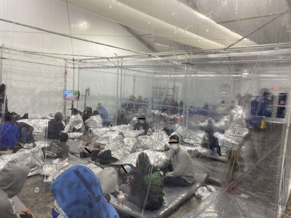 PHOTO: A photo released by Congressman Henry Cuellar's office shows a crowded U.S. Customs and Border Protection temporary overflow facility in Donna, Texas. According to Rep. Cueller, the photo was taken between March 20-21, 2021.