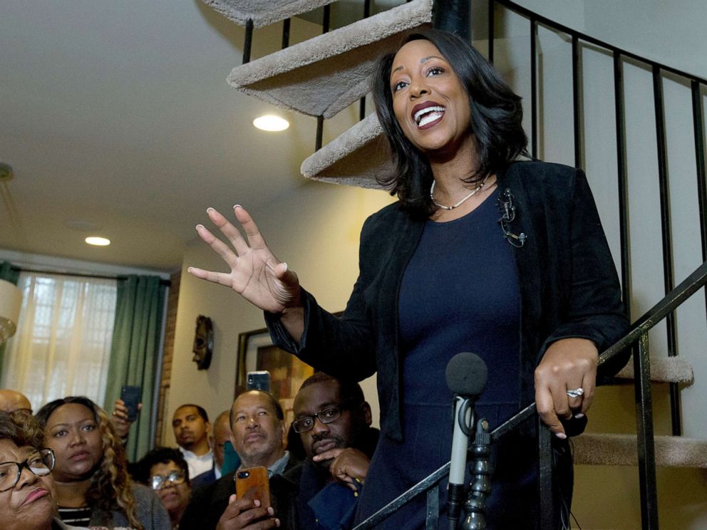 PHOTO: Maya Rockeymoore Cummings speaks to the media and supporters from the stairs of her home announcing her campaign for her late husbands congressional seat, in Baltimore, Nov. 12, 2019.
