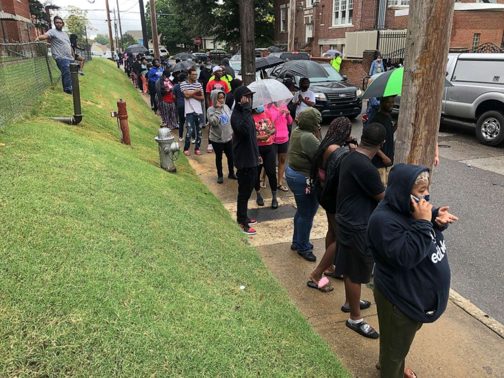 PHOTO: Concerned relatives of school children wait at a church that is serving as a staging area after a shooting at Cummings School, Sept. 30, 2021 in Memphis, Tenn.