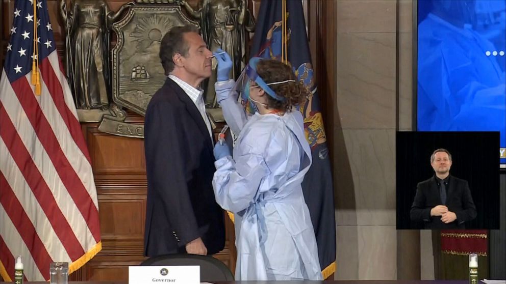 PHOTO: New York Gov. Andrew Cuomo receives a COVID-19 swab test during his daily briefing, May 17, 2020, in Albany, New York.