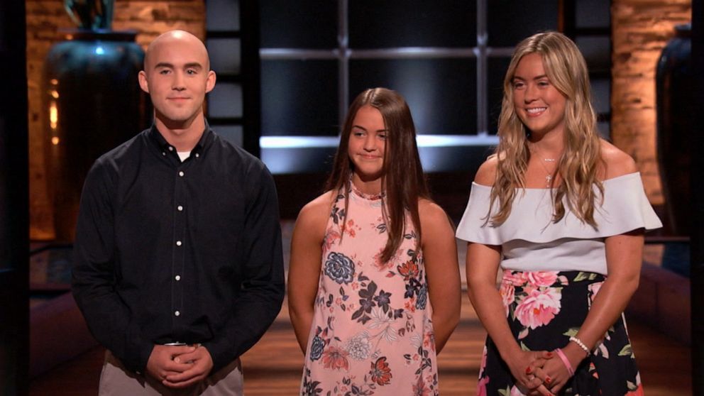 PHOTO: Kaley, Christian and Keira Young turned their dad Keith Young's cutting board product into an irresistible investment opportunity for all five sharks; each invested in the Cup Board Pro in 2018. 