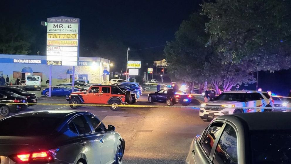 PHOTO: A view of the parking lot outside V Luxx Hookah Lounge, where one person was shot and killed in Fayetteville, North Carolina, on Sunday, April 2, 2023.