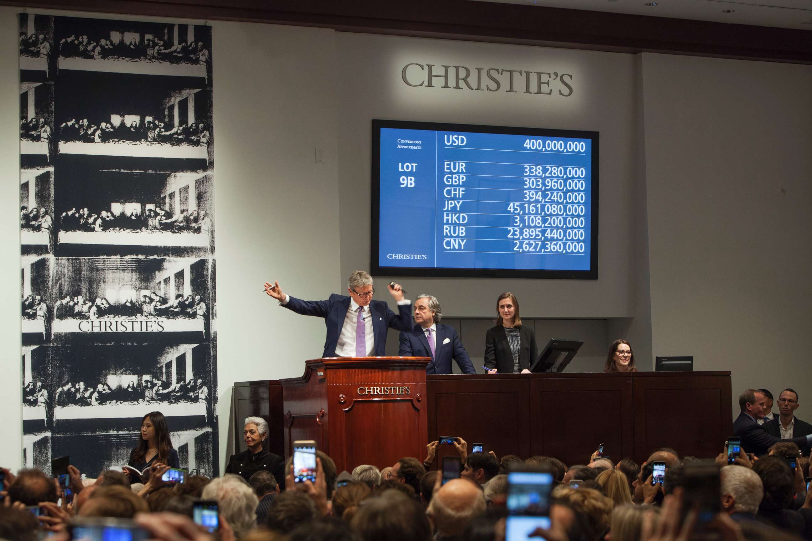 PHOTO: Auctioneer and Global President Jussi Pylkkanen is selling Leonardo da Vinci's Salvator Mundi (Savior of the World) painting for $450,312,500 at Christie's, Nov. 15, 2017, in New York City.