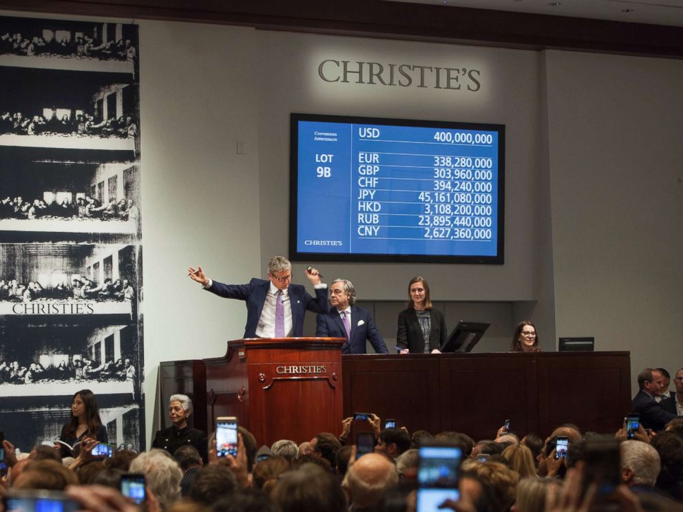 PHOTO: Auctioneer and Global President Jussi Pylkkanen is selling Leonardo da Vincis Salvator Mundi (Savior of the World) painting for $450,312,500 at Christies, Nov. 15, 2017, in New York City.