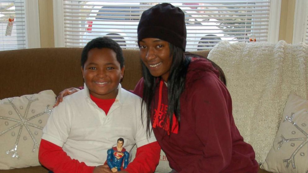 PHOTO: Daerye, 8, and his mother, Dionna Neely, of Detroit, Michigan, in their new home. Their home was furnished and decorated for free by Humble Design, a charity that helps the formerly homeless.
