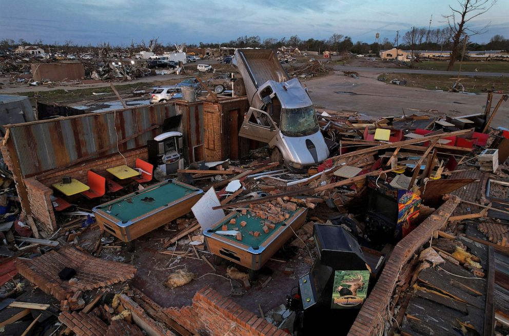 PHOTO: A pickup truck sits on top of the wreckage of Chuck's Dairy Cafe after thunderstorms spawning high straight-line winds and tornadoes ripped across the state, in Rolling Fork, Miss., March 26, 2023.