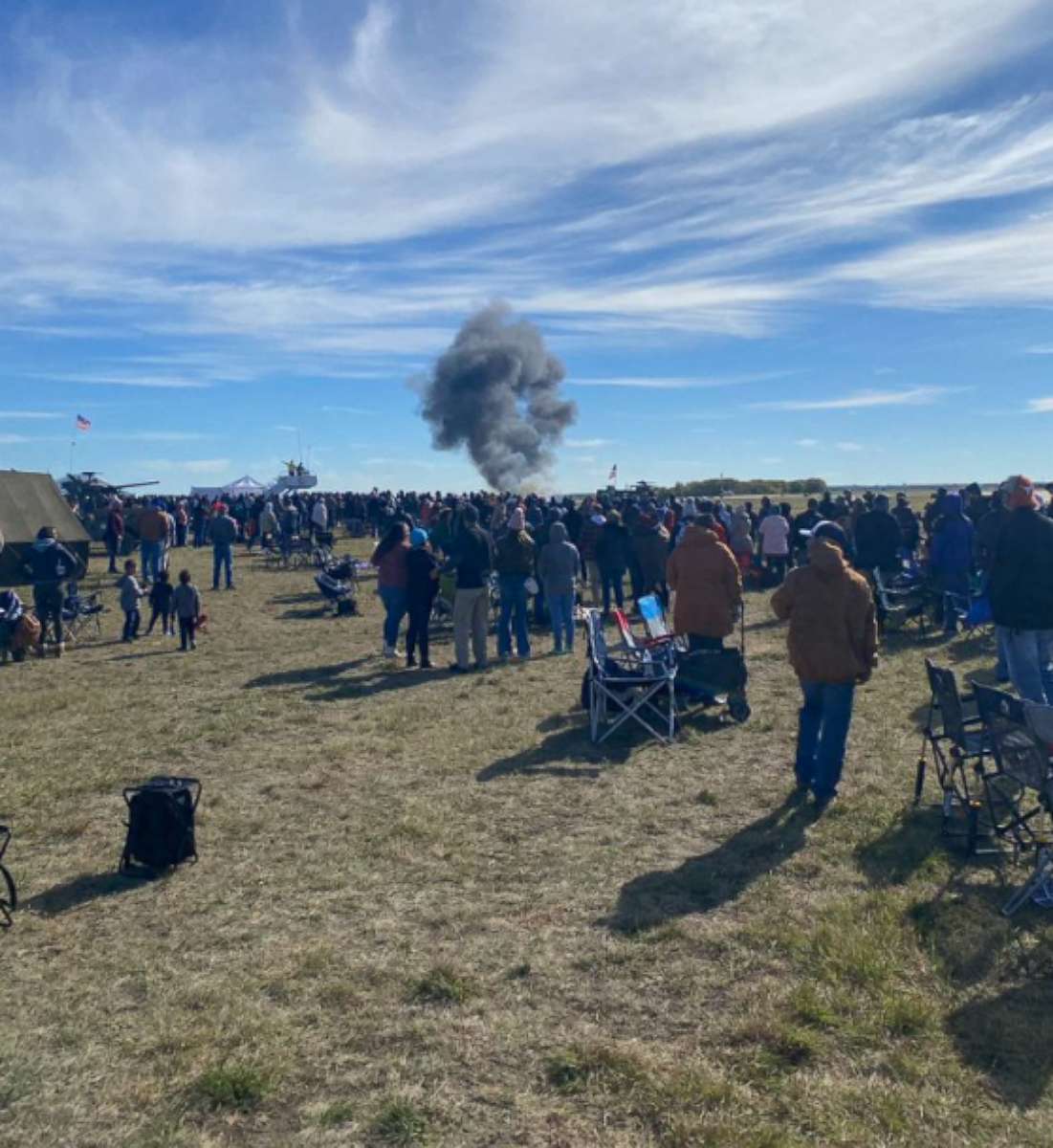 PHOTO: Bystander footage captures a cloud of smoke after an incident at a World War II airshow at Dallas Executive Airport, Nov. 12, 2022.