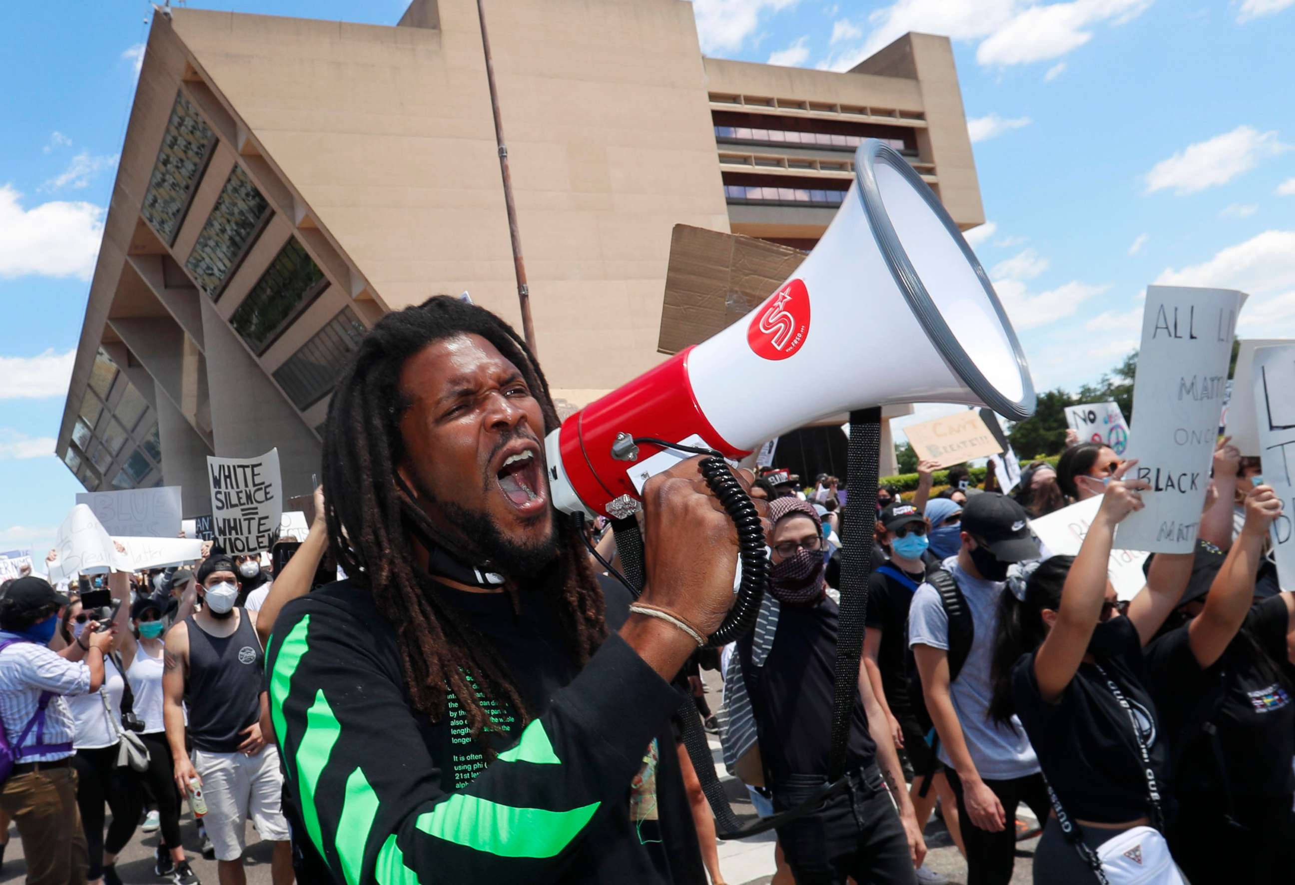 PHOTO: In this May 30, 2020, file photo, protesters chant in front of Dallas City Hall in downtown Dallas.