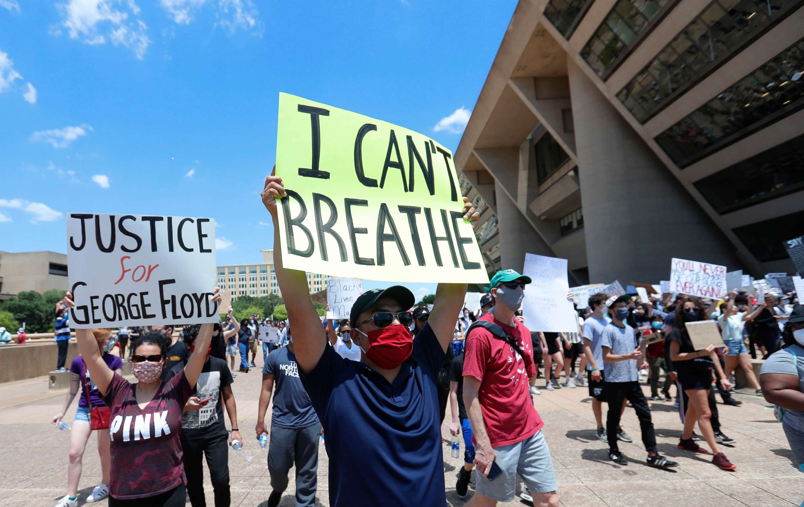 PHOTO: In this May 30, 2020, file photo, protesters demonstrate in front of Dallas City Hall in downtown Dallas.