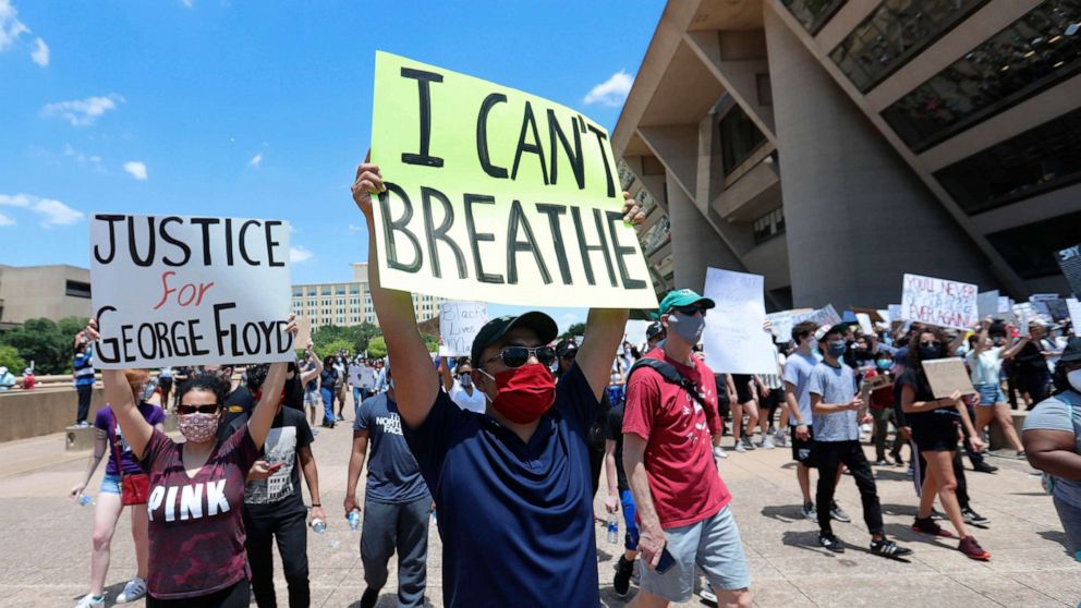 PHOTO: In this May 30, 2020, file photo, protesters demonstrate in front of Dallas City Hall in downtown Dallas.