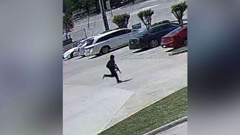PHOTO: Police released a security camera image of a gunman seen running from a triple shooting on May 11, 2022, at a hair salon in the Dallas' Koreatown district. 