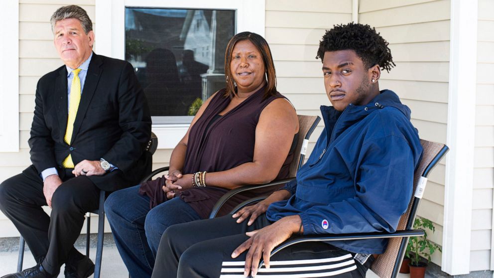 PHOTO: In this Thursday, May 7, 2020, photo, provided by the Port City Daily, high school senior Dameon Shepard, right, his mother, Monica Shepard, and their attorney Jim Lea, left, pose for a photo at the Shepard's home in the Rocky Point, N.C.