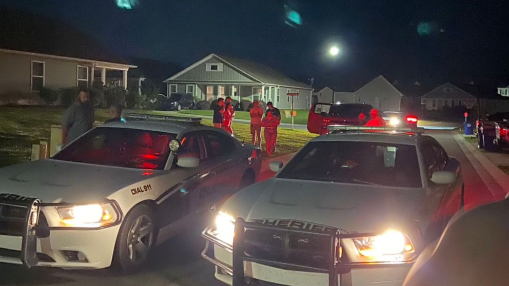 PHOTO: In this scene taken from video, police cars are shown outside the Shepard home on the night of the incident.