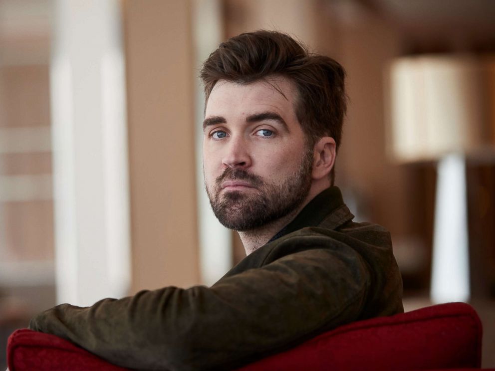 PHOTO: Author Dan Mallory, who writes under the name A. J. Finn, poses during the presentation of his debut novel The Woman In The Window in Barcelona, April 9, 2018.
