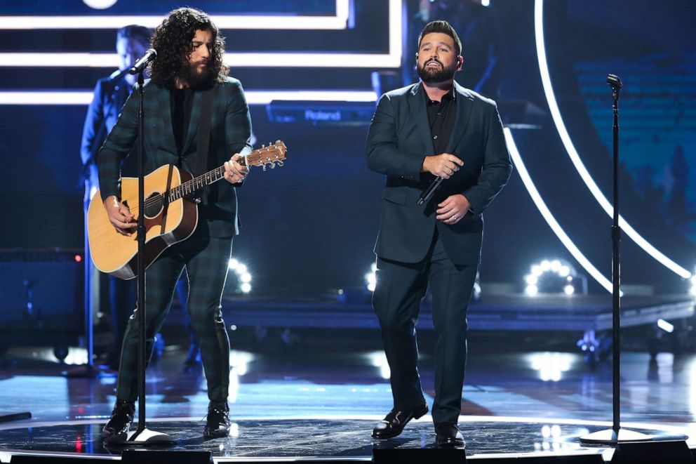 PHOTO: (L-R) Honorees Dan Smyers and Shay Mooney of Dan + Shay perform onstage during the 2019 CMT Artists of the Year at Schermerhorn Symphony Center on October 16, 2019, in Nashville, Tenn.