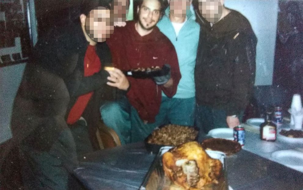 PHOTO: Daniel Genis and other inmates observe Thanksgiving with a turkey in prison in 2008.