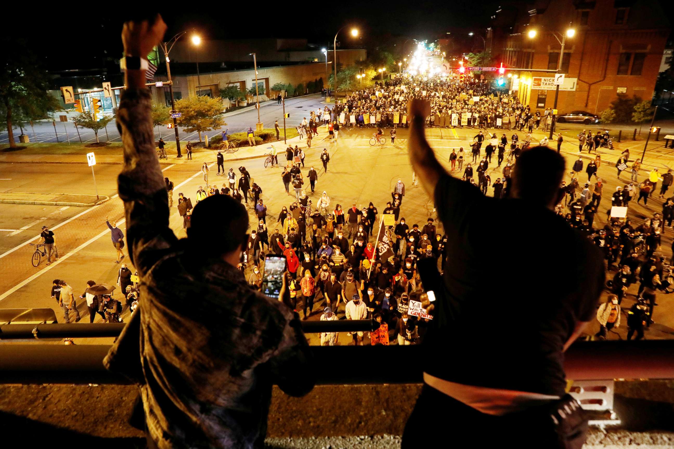 PHOTO: People raise their fists as demonstrators take part in a protest over the death of Daniel Prude during an arrest on March 23, in Rochester, N.Y., Sept. 5, 2020