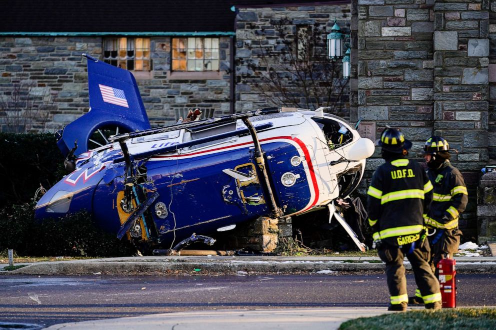 PHOTO: A medical helicopter rests next to the Drexel Hill United Methodist Church after it crashed in the Drexel Hill section of Upper Darby, Pa., Jan. 11, 2022.