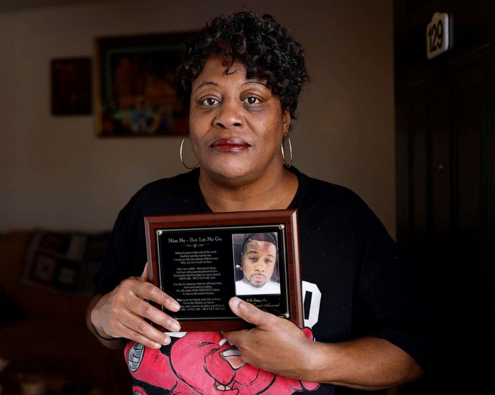 PHOTO: Sonya Williams, mother of Darryl Tyree Williams, poses for a portrait holding a plaque in memory of her son, at her home in Wendell, N.C., on Feb. 14, 2023.