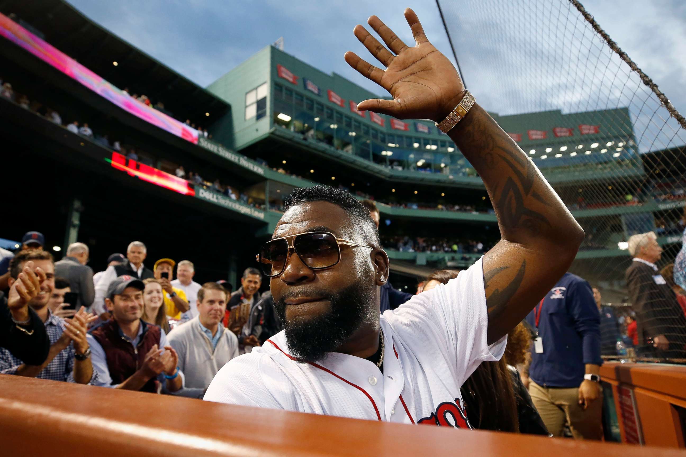 PHOTO: Former Boston Red Sox's David Ortiz waves to the crowd after throwing out a ceremonial first pitch before a baseball game against the New York Yankees in Boston, Sept. 9, 2019.