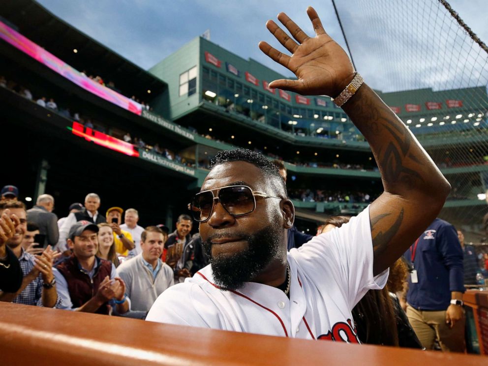 PHOTO: Former Boston Red Soxs David Ortiz waves to the crowd after throwing out a ceremonial first pitch before a baseball game against the New York Yankees in Boston, Sept. 9, 2019.