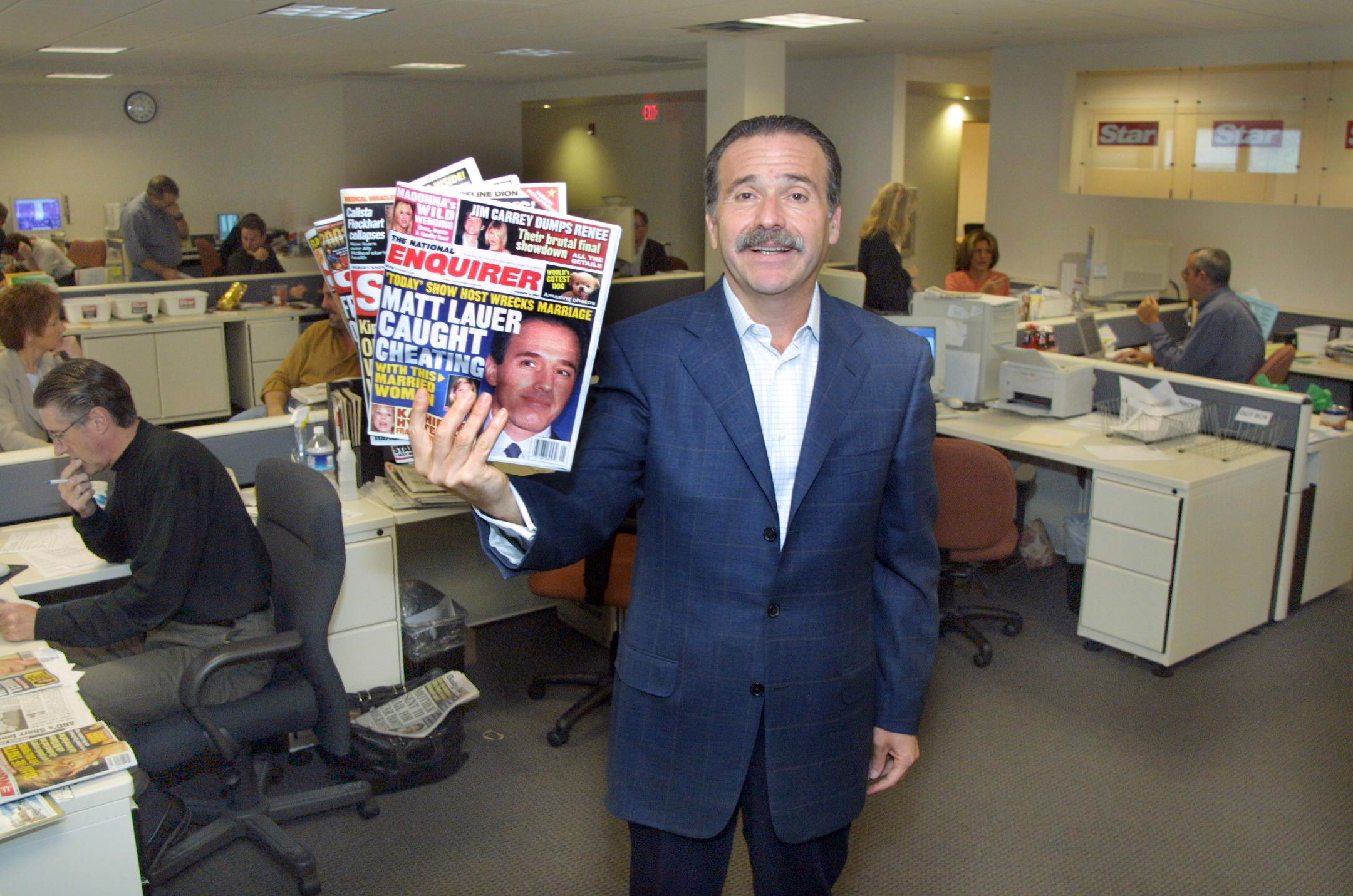 PHOTO: David Pecker, CEO of American Media Inc., poses for a photo in Boca Raton, Fla., Dec. 12, 2000.