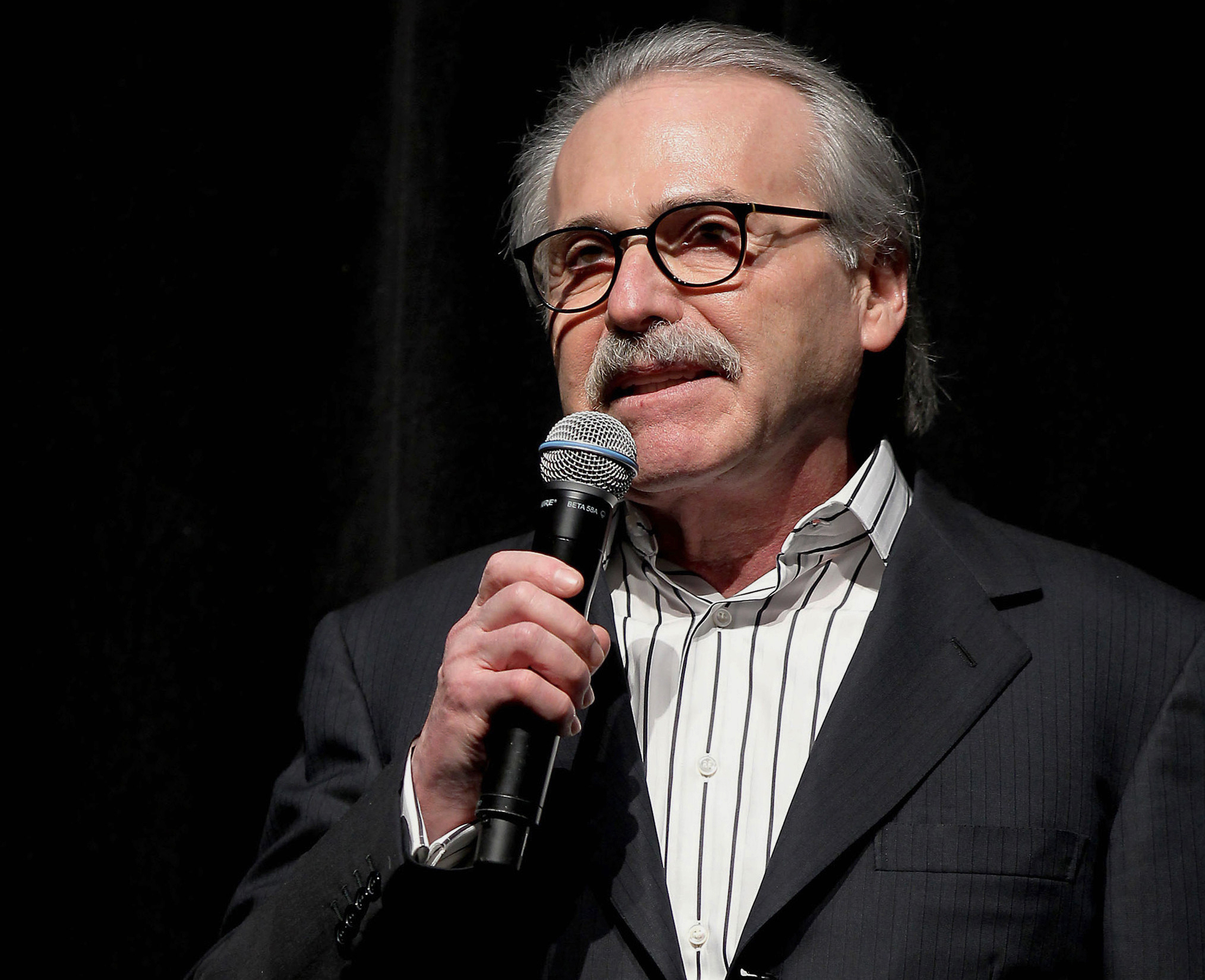 PHOTO: In this Jan. 31, 2014 photo, David Pecker, chairman and CEO of American Media, addresses those attending the Shape & Men's Fitness Super Bowl Party in New York. 
