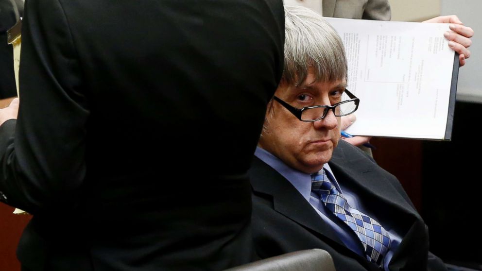David Turpin looks up as he and Louise Turpin appear in court in Riverside, Calif., on Feb. 23, 2018. 