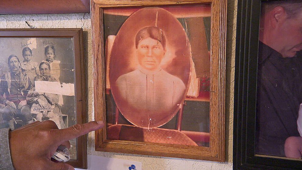 PHOTO: Principal Chief David Hill of the Muscogee Creek Nation points to a picture of his great grandmother, who he said lived during the U.S. government's forced relocation of Native Americans in the 1800s, known as the "Trail of Tears."