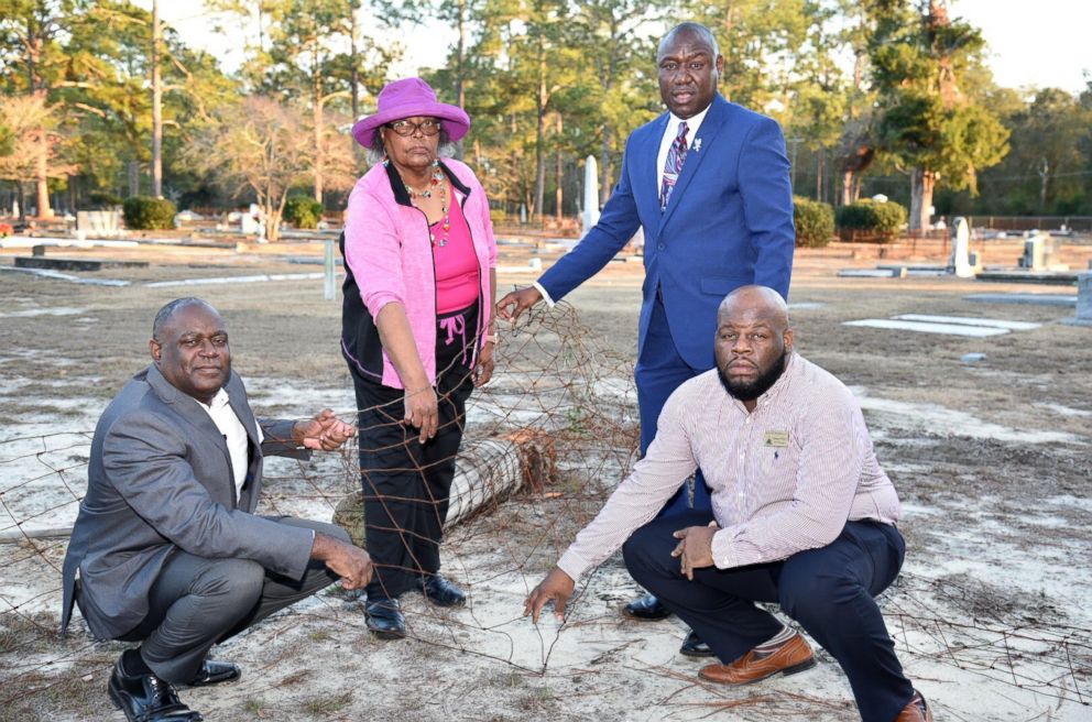 PHOTO: From left, Mayor Rufus Davis, Priscilla Davis, Ben Crump and Councilman Venterra Pollard stand at the site of the fence that once marked the segregation of blacks from whites at Oakview Cemetery in Camilla, Ga., Jan. 11, 2018.