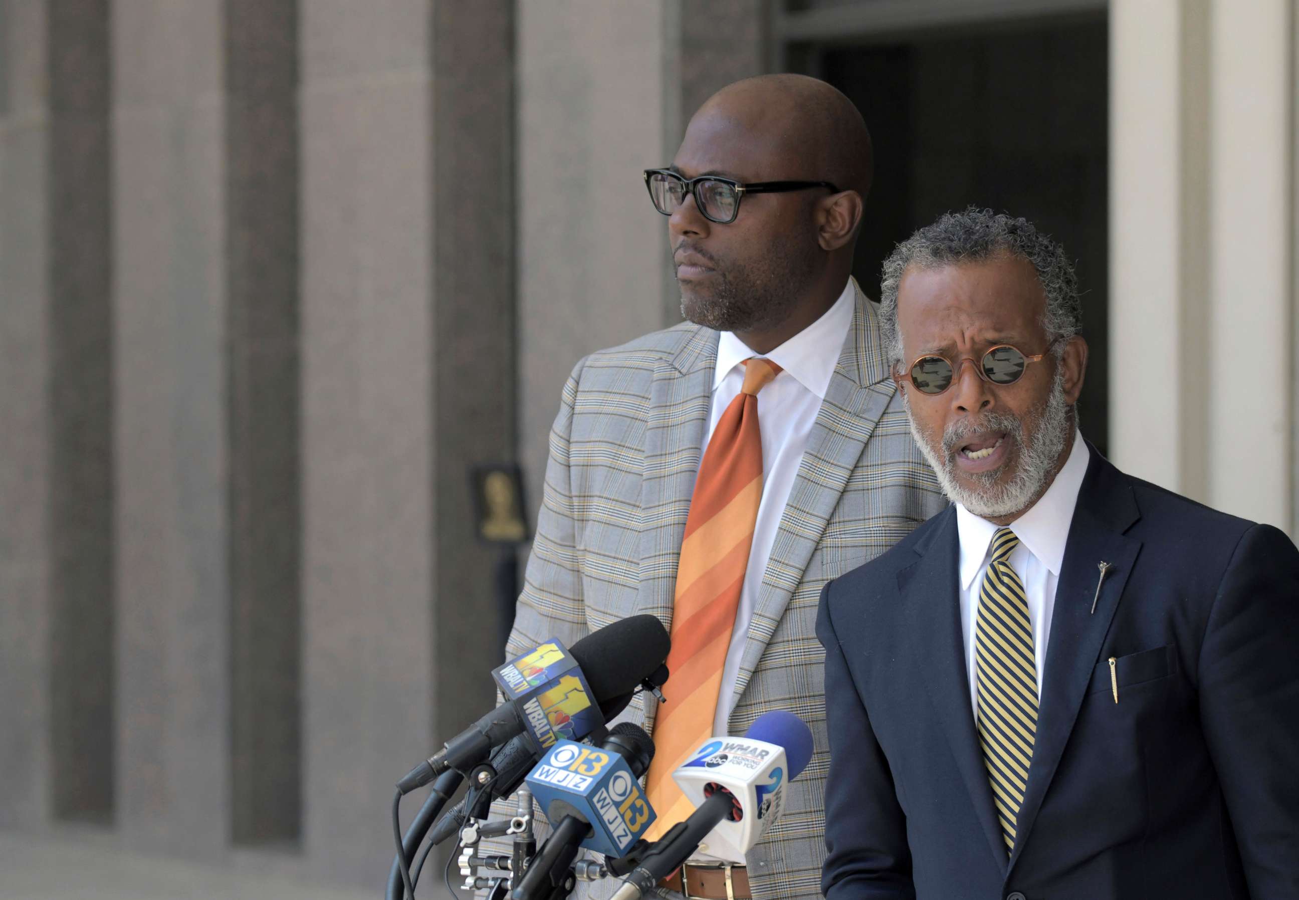 PHOTO: Defense attorneys J. Wyndal Gordon, left, and Warren Brown speak following the life sentence, meted out for 17-year-old Dawnta Harris at Baltimore County Circuit Court,  Aug. 21, 2019, in Towson, Md.
