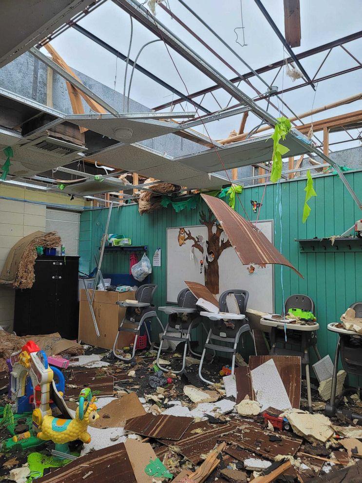 PHOTO: After the roof collapsed, highchairs, toys, and learning materials were covered in debris.