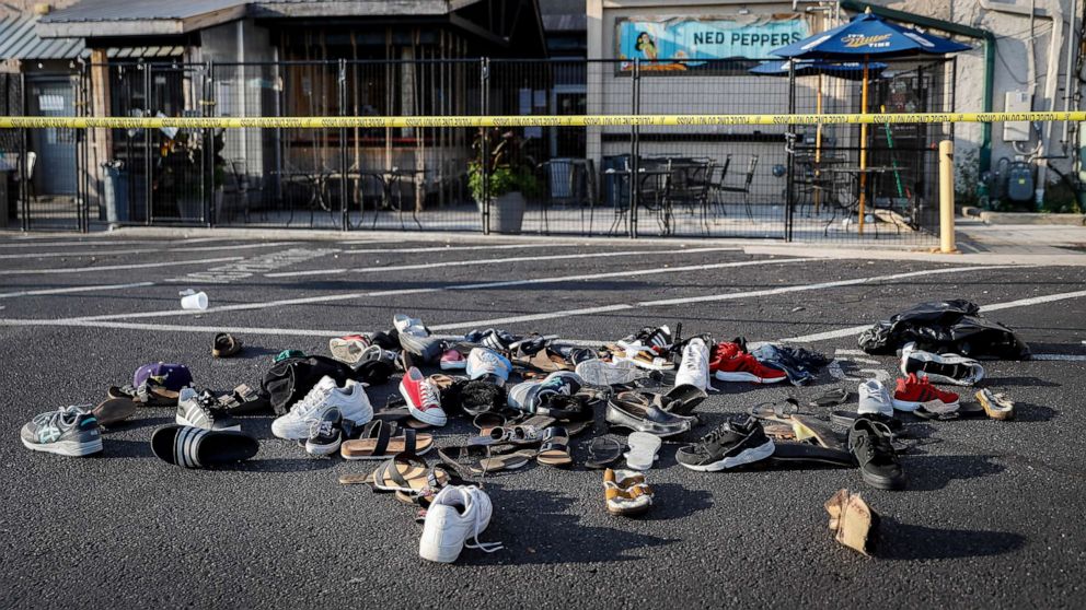 PHOTO: Shoes are piled outside the scene of a mass shooting including Ned Peppers bar, Aug. 4, 2019, in Dayton, Ohio. Several people in Ohio have been killed in the second mass shooting in the U.S. in less than 24 hours.
