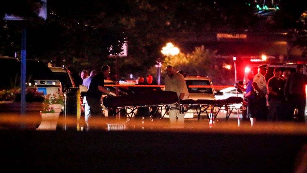 PHOTO: Bodies are removed from at the scene of a mass shooting, Sunday, Aug. 4, 2019, in Dayton, Ohio.