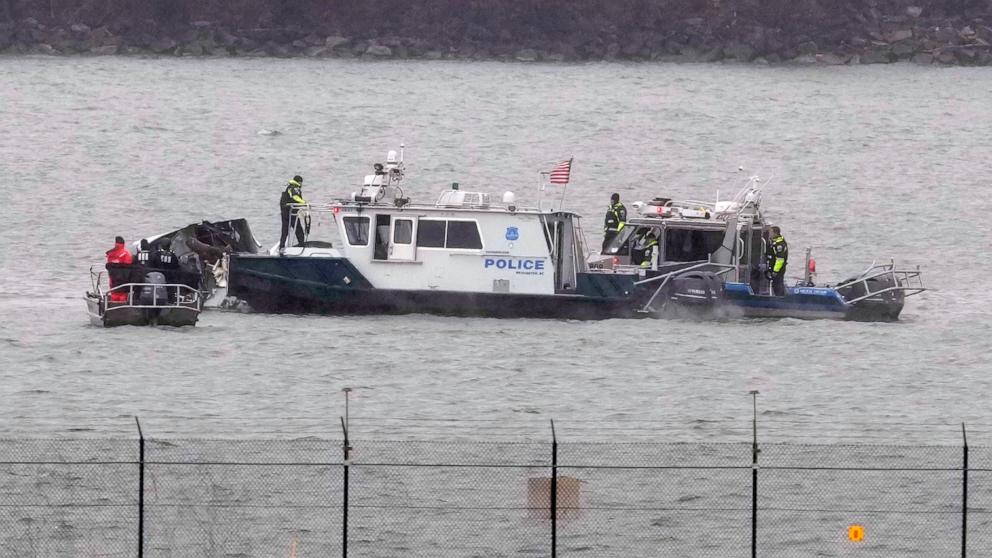 PHOTO: Search efforts are seen around a wreckage site of a deadly midair collision between an American Airlines jet and an Army helicopter, in the Potomac River near Ronald Reagan Washington National Airport, Jan. 31, 2025, in Arlington, Va. 